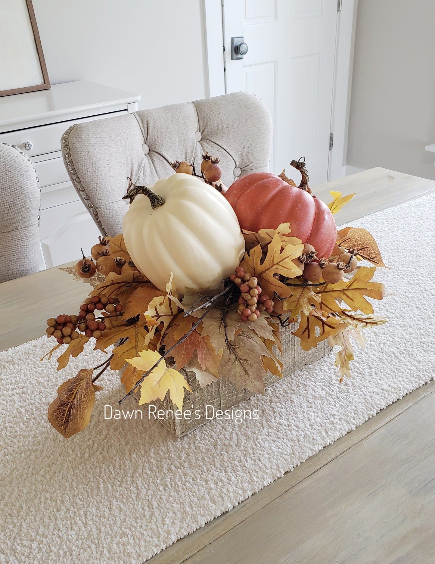 Pumpkin Centerpiece with Fall Leaves and Berries